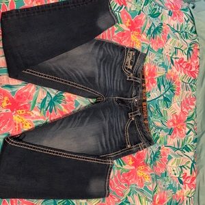 Size 28 NWOT. Never worn